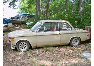 Illustration for article titled How To Stay Classy In A BMW 2002 Without Breaking The Bank